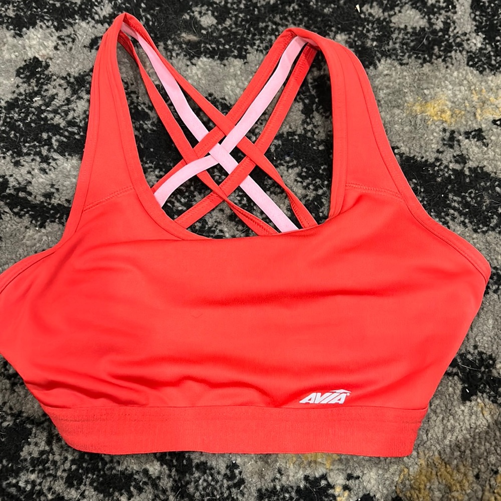Avia sports bra! I’m a orangey color and pink. *doesn’t come with padding*
